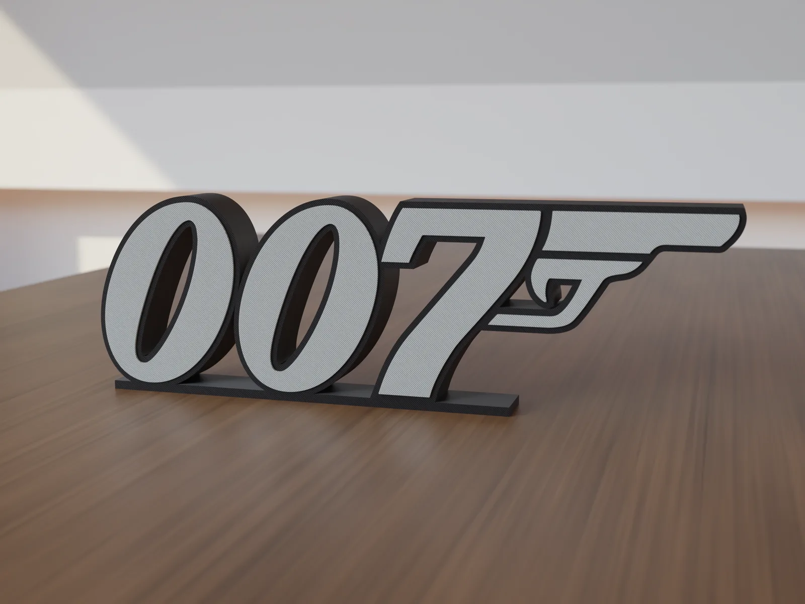 Freestanding 3D-printed logo sign, front view, 300mm size, standing on a wooden table.