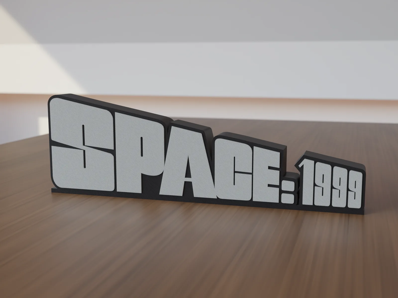 Freestanding 3D-printed logo sign, front view, 300mm size, standing on a wooden table.