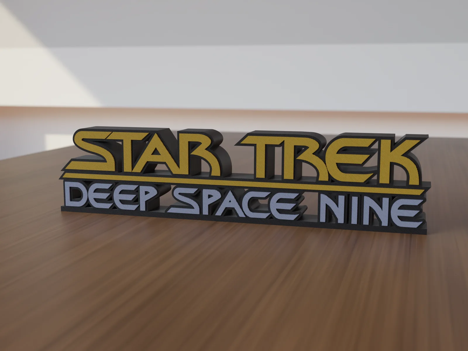 Freestanding 3D-printed logo sign, front view, 300mm size, standing on a wooden table.