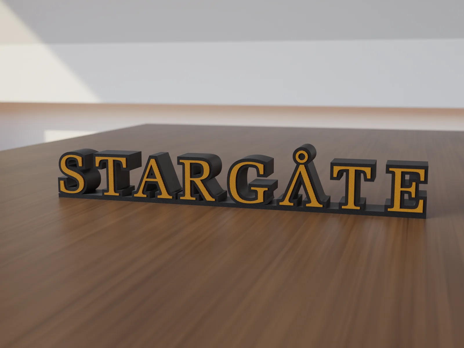Freestanding 3D-printed logo sign, front view, 300mm size, standing on a wooden table.